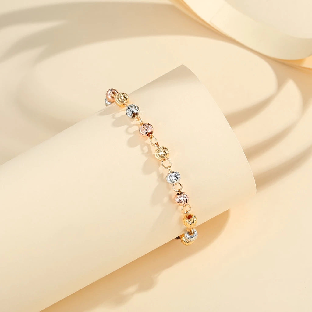 Copper gold-plated beaded bracelet with curved knife beads