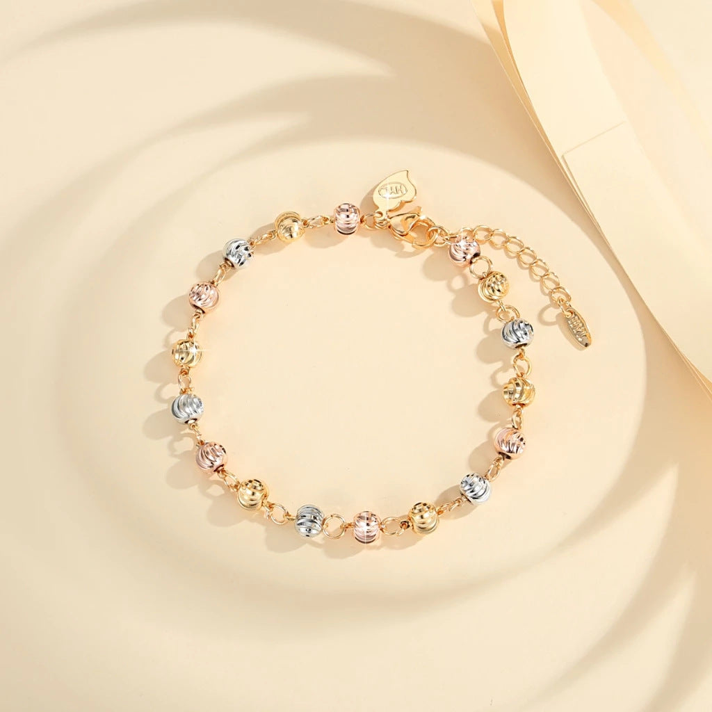 Copper gold-plated beaded bracelet with curved knife beads