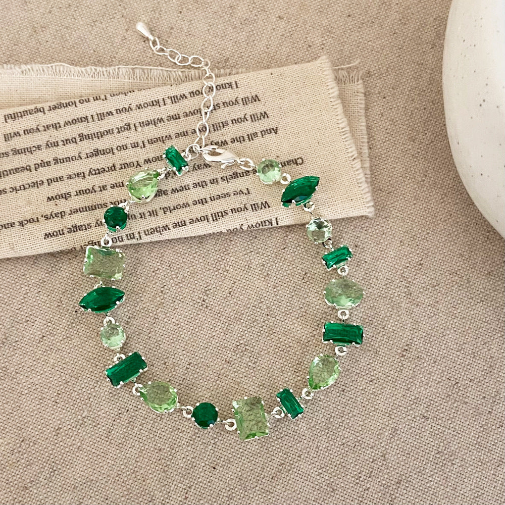 Clover micro-inlaid zircon hollowed-out bracelet