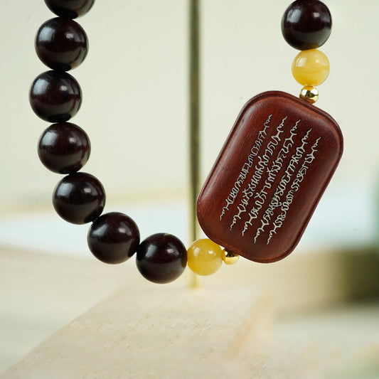 A silver-inlaid five-striped bracelet made of sandalwood and a small-leaf red sandalwood Zen bracelet