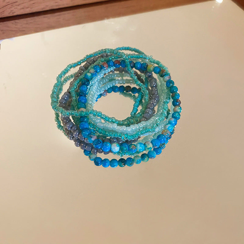 Bohemian-style stacked rice bead bracelet