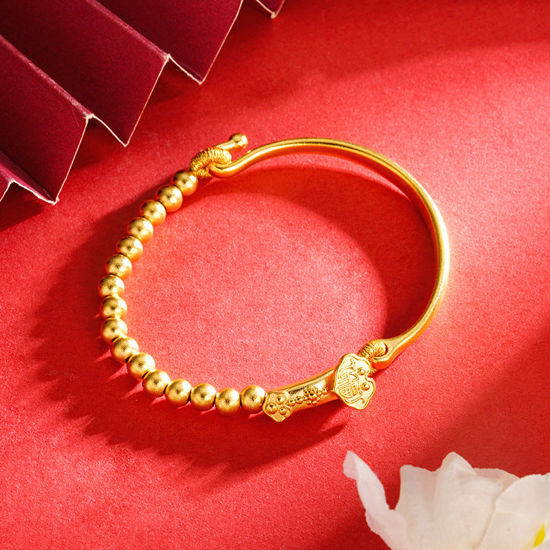 A sand-gold bracelet with a few taels of broken silver and bamboo joints