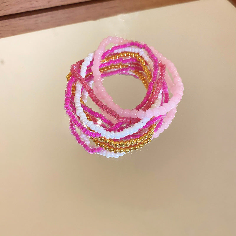 Bohemian-style stacked rice bead bracelet
