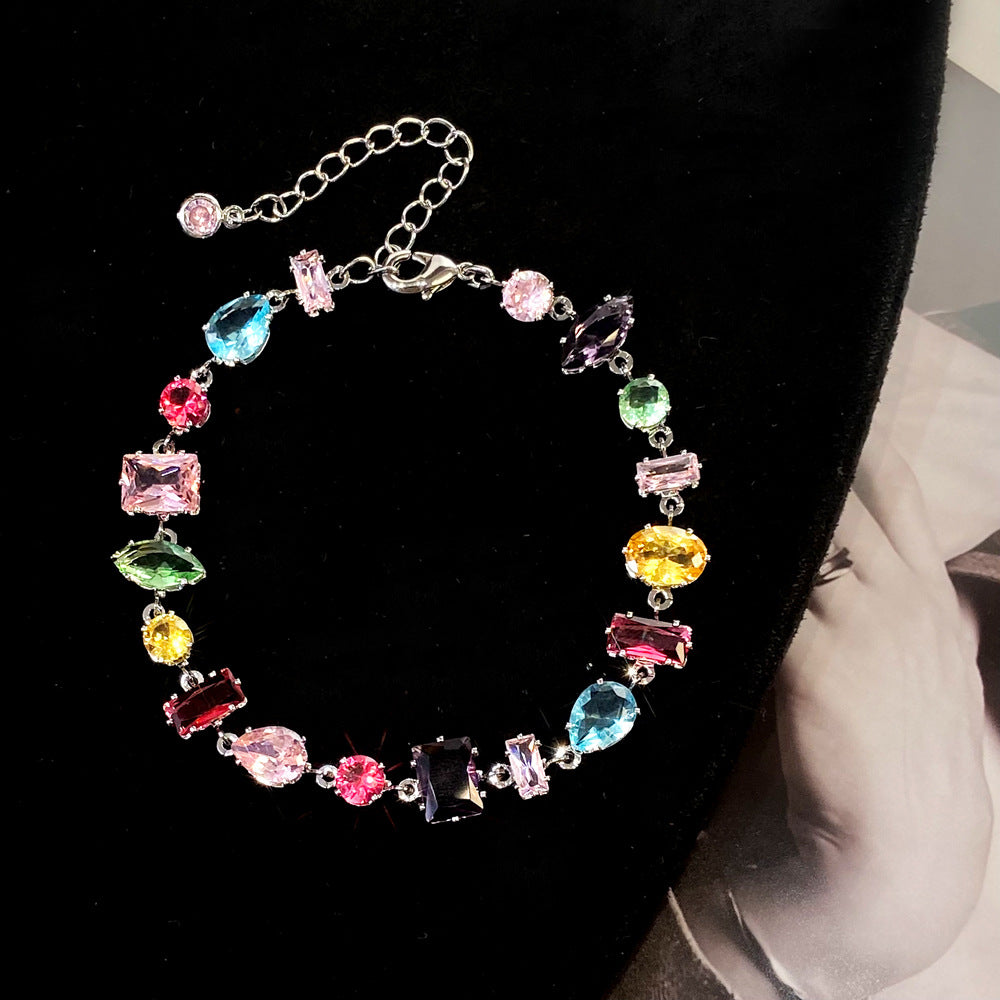 Clover micro-inlaid zircon hollowed-out bracelet