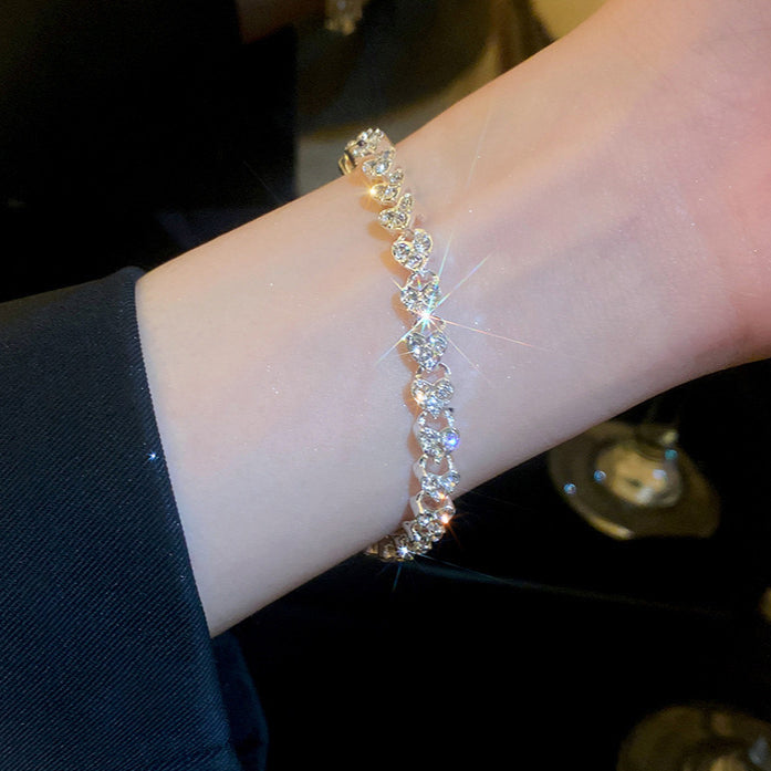 Diamond-encrusted heart-shaped personalized bracelet