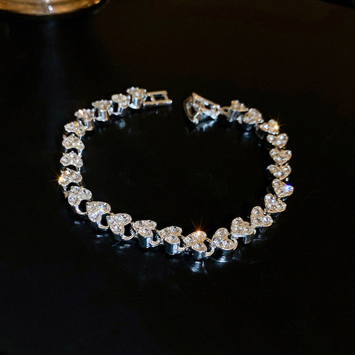 Diamond-encrusted heart-shaped personalized bracelet