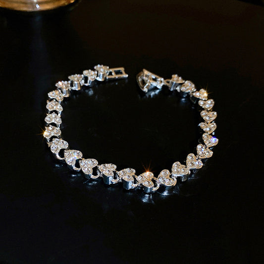 Diamond-encrusted heart-shaped personalized bracelet