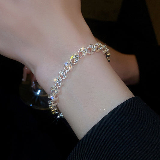 Diamond-encrusted heart-shaped personalized bracelet