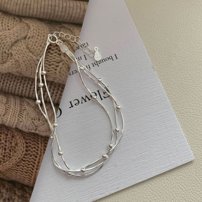 S925 sterling silver three-layer interlaced pearl snake bone bracelet