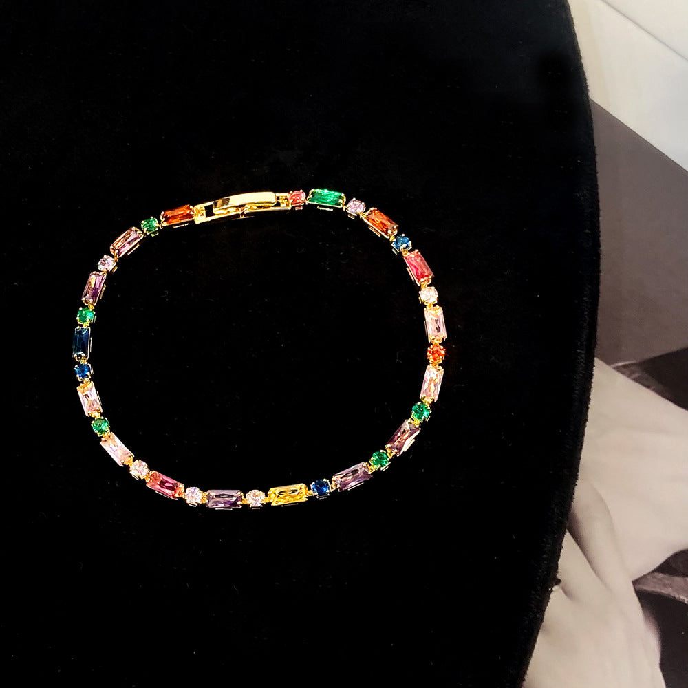 Clover micro-inlaid zircon hollowed-out bracelet