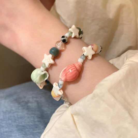 Beach bracelet, vacation conch, star ceramic beads