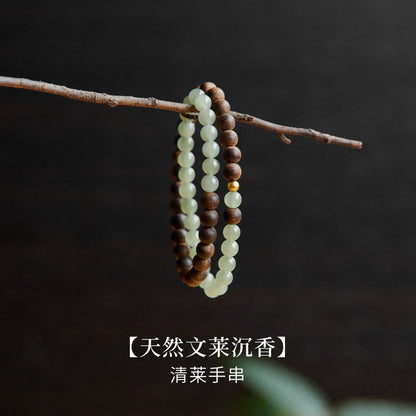 A natural Hetian jade bead double-loop bracelet played with agarwood beads