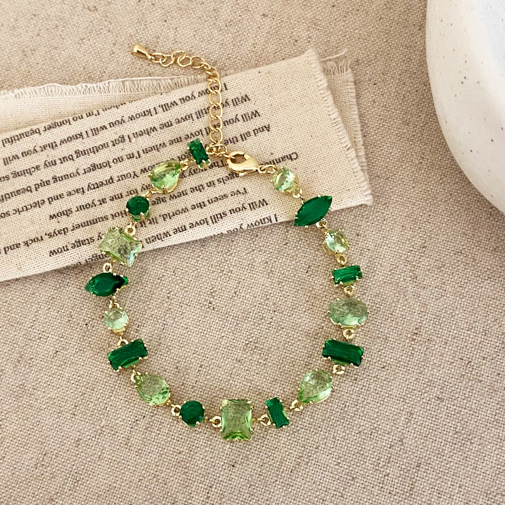 Clover micro-inlaid zircon hollowed-out bracelet