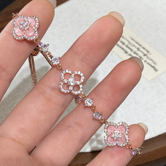 Clover micro-inlaid zircon hollowed-out bracelet
