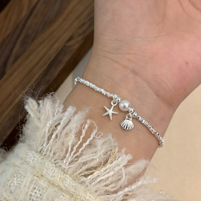 Starfish shell fragments silver pearl bracelet