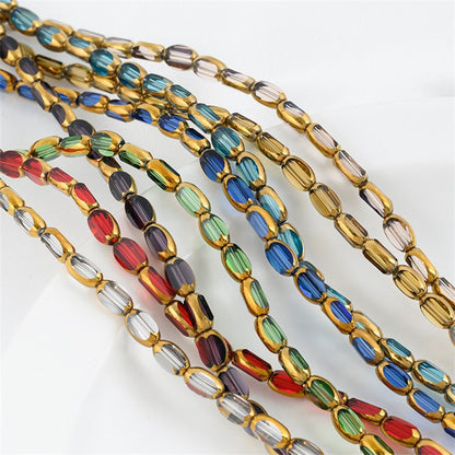 DIY loose bead handcrafted bracelet with transparent crystal glass surface and golden edge oval rice grain beads