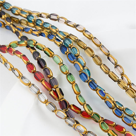 DIY loose bead handcrafted bracelet with transparent crystal glass surface and golden edge oval rice grain beads