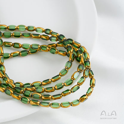 DIY loose bead handcrafted bracelet with transparent crystal glass surface and golden edge oval rice grain beads