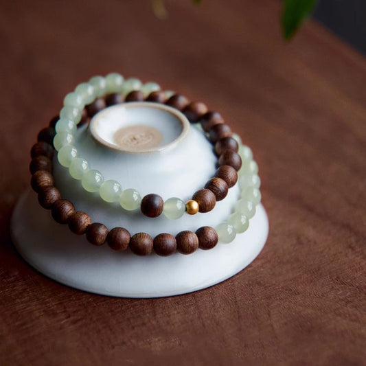 A natural Hetian jade bead double-loop bracelet played with agarwood beads