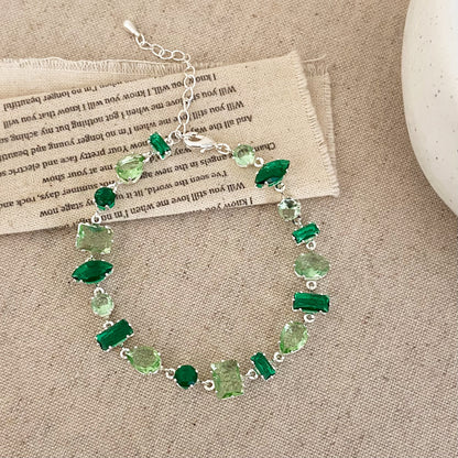 Clover micro-inlaid zircon hollowed-out bracelet