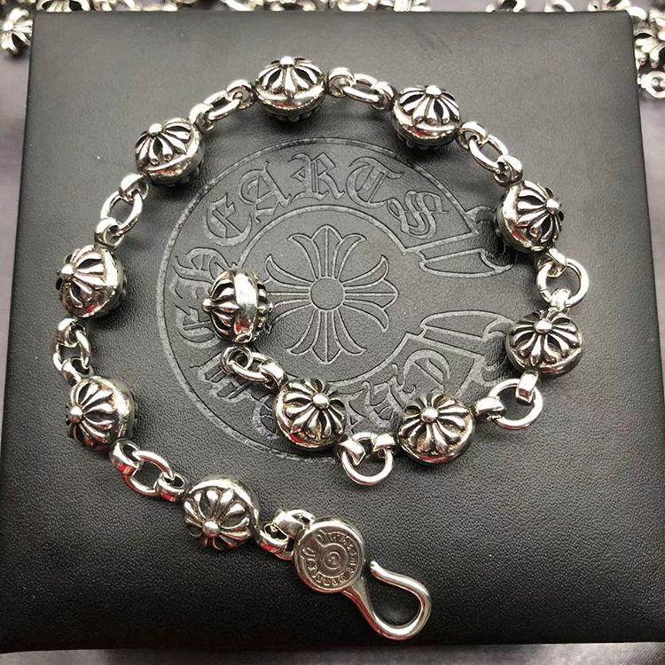 The S925 bracelet features a sword, anchor and cross flower