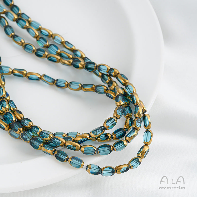 DIY loose bead handcrafted bracelet with transparent crystal glass surface and golden edge oval rice grain beads