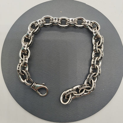 The S925 bracelet features a sword, anchor and cross flower