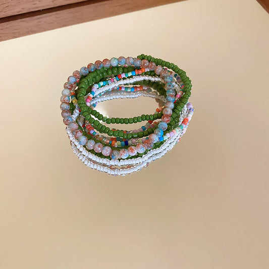 Bohemian-style stacked rice bead bracelet