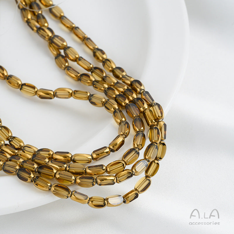 DIY loose bead handcrafted bracelet with transparent crystal glass surface and golden edge oval rice grain beads