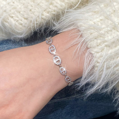 Clover micro-inlaid zircon hollowed-out bracelet