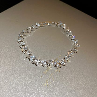 Diamond-encrusted heart-shaped personalized bracelet