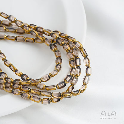 DIY loose bead handcrafted bracelet with transparent crystal glass surface and golden edge oval rice grain beads