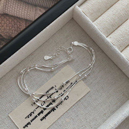 S925 sterling silver three-layer interlaced pearl snake bone bracelet