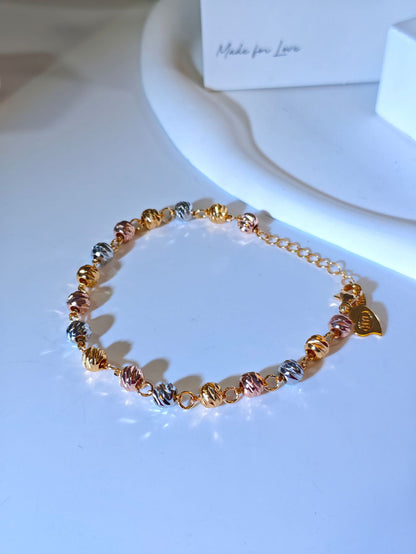 Copper gold-plated beaded bracelet with curved knife beads