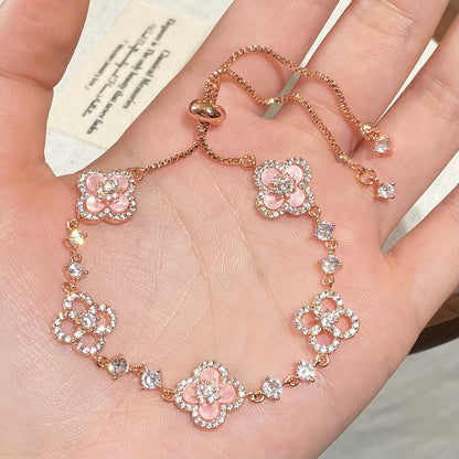 Clover micro-inlaid zircon hollowed-out bracelet