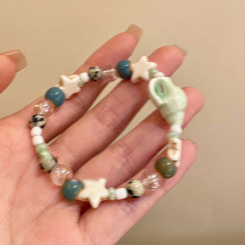 Beach bracelet, vacation conch, star ceramic beads