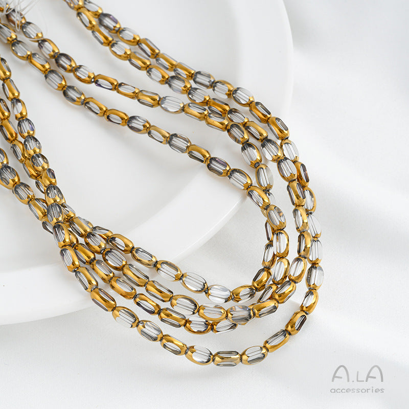 DIY loose bead handcrafted bracelet with transparent crystal glass surface and golden edge oval rice grain beads