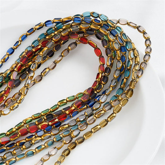 DIY loose bead handcrafted bracelet with transparent crystal glass surface and golden edge oval rice grain beads