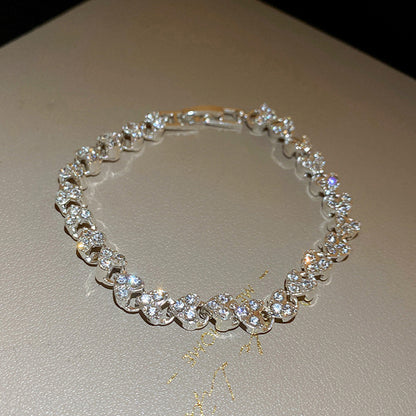 Diamond-encrusted heart-shaped personalized bracelet